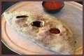 How big is a mellow mushroom calzone?