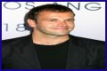 Jonny Lee Miller flashes ink for Ellen charity